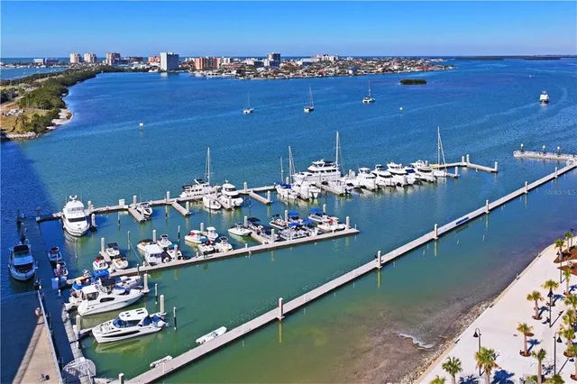 an aerial view of a house with a ocean view