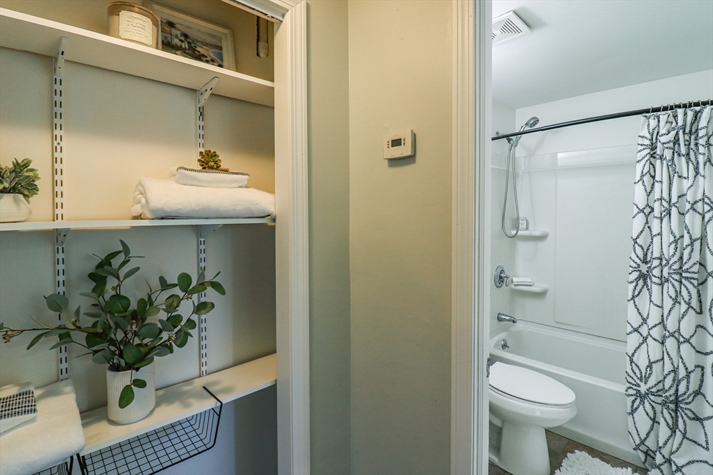1114 Allen Street Springfield, MA 01118 - Photo 18 of 25 a bathroom with a sink toilet and shower