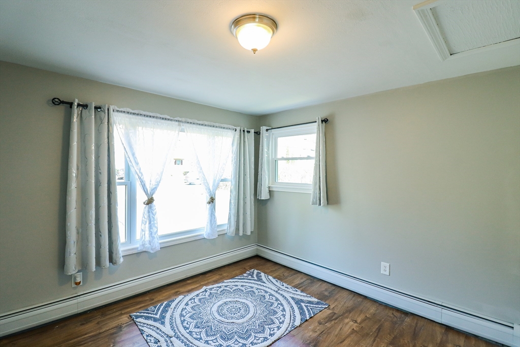 1114 Allen Street Springfield, MA 01118 - Photo 21 of 25 an empty room with windows