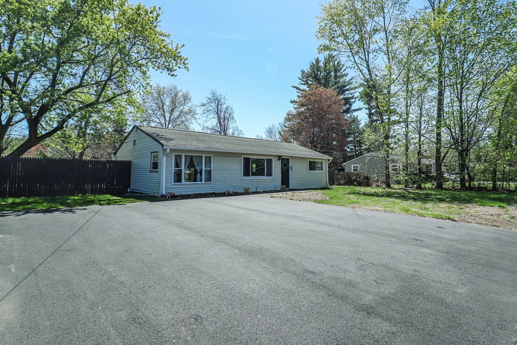 1114 Allen Street Springfield, MA 01118 - Photo 3 of 25 a front view of house with yard and green space