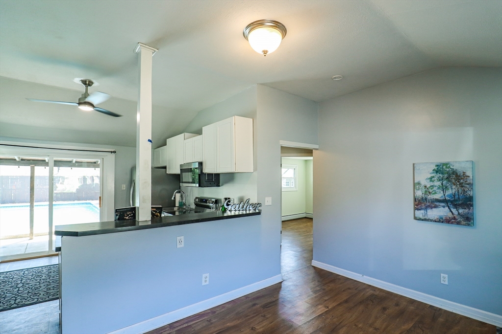 1114 Allen Street Springfield, MA 01118 - Photo 8 of 25 a kitchen with stainless steel appliances a counter top space sink and window