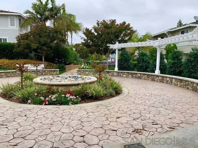 6921 Catamaran Drive Carlsbad, CA 92011 - Photo 18 of 26 a view of a garden with a patio