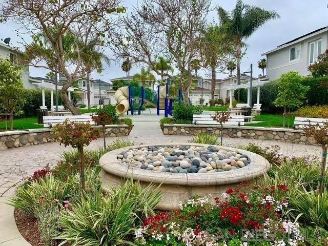 6921 Catamaran Drive Carlsbad, CA 92011 - Photo 19 of 26 a view of a house with garden and sitting area
