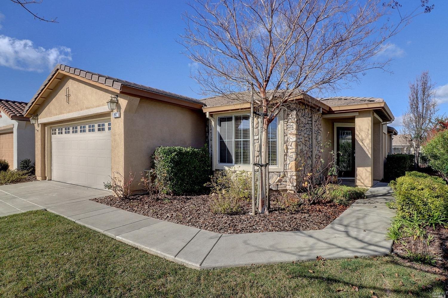 141 Springhill Drive Rio Vista, CA 94571 - Photo 1 of 1 Pretty exterior with stone front and full length leaded glass entry door