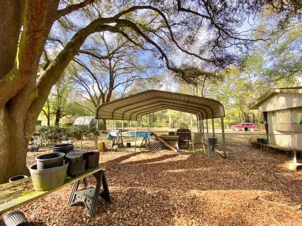 a view of a park with swings and slides
