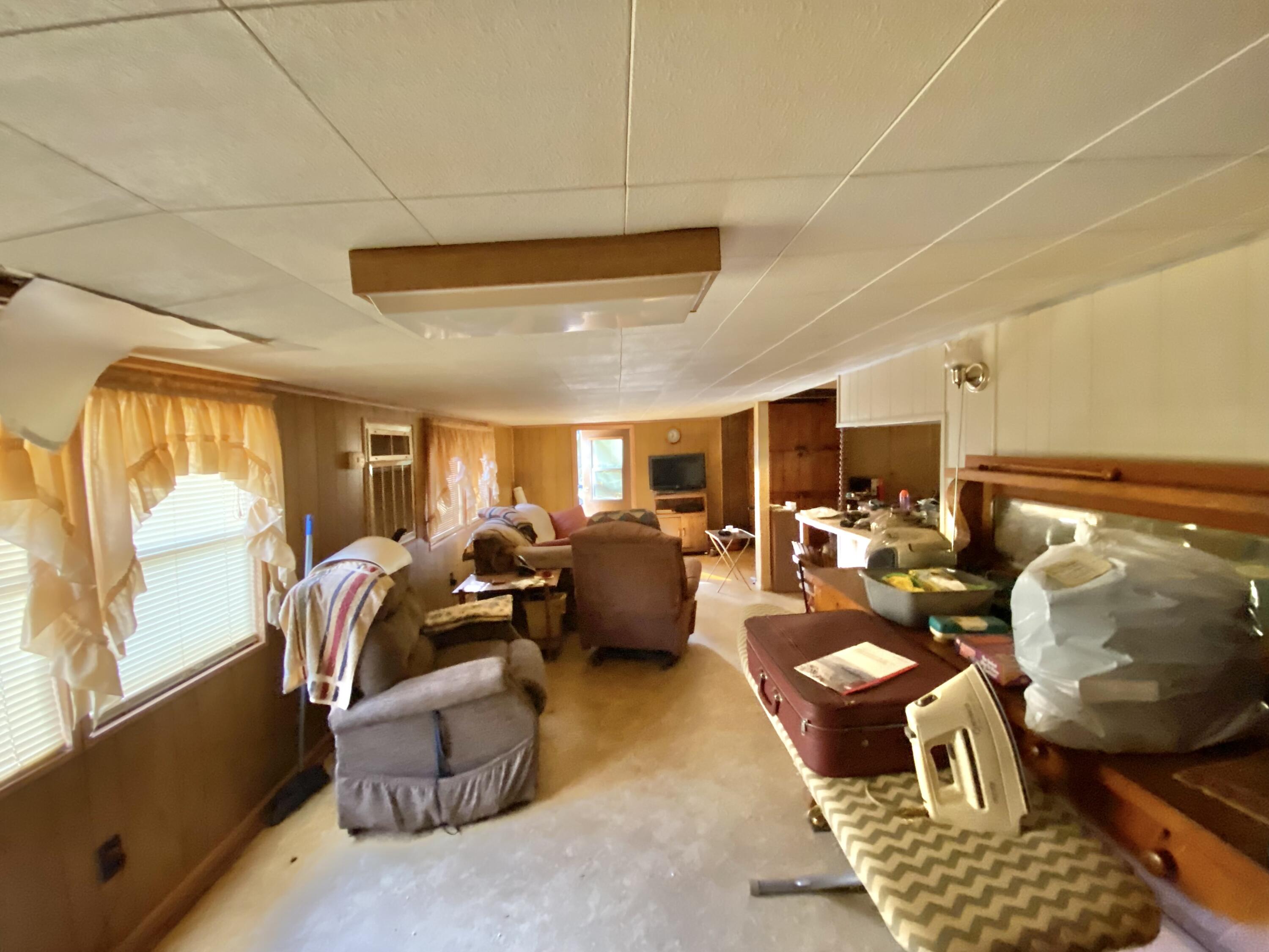 3210 Wells Avenue Crestview, FL 32539 - Photo 19 of 21 a very nice looking living room with a couch and a large window