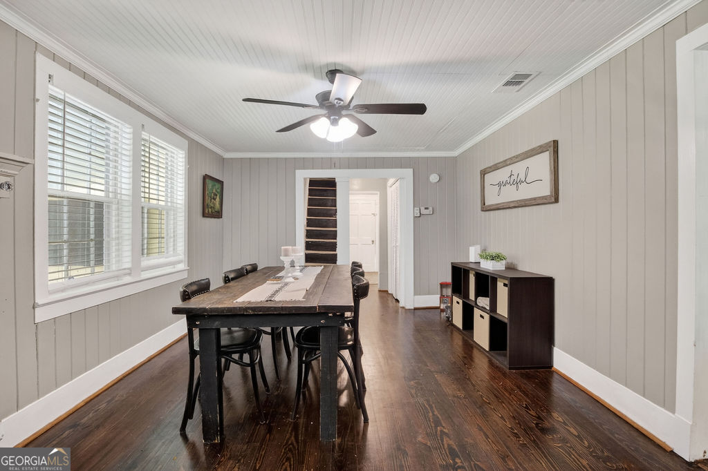 2051 Emmett Doster Road Northwest Monroe, GA 30656 - Photo 15 of 50 a view of a dining room with furniture window and wooden floor