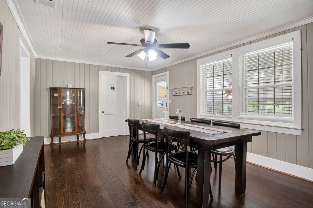 2051 Emmett Doster Road Northwest Monroe, GA 30656 - Photo 17 of 50 a view of a a dining room with furniture window and wooden floor