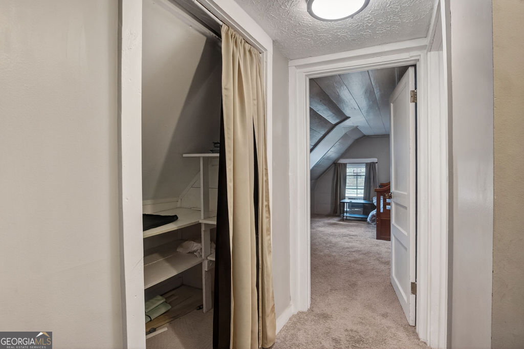 2051 Emmett Doster Road Northwest Monroe, GA 30656 - Photo 23 of 50 a view of a hallway with a closet and a closet