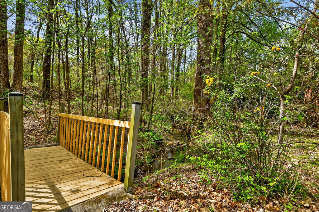 2051 Emmett Doster Road Northwest Monroe, GA 30656 - Photo 33 of 50 a view of a wooden fence and trees