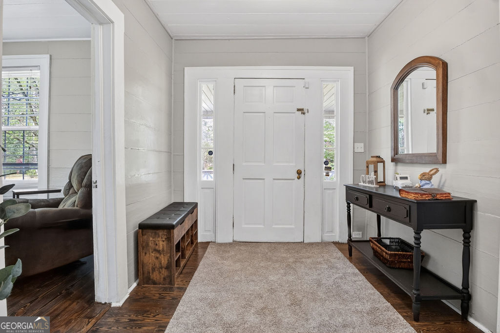 2051 Emmett Doster Road Northwest Monroe, GA 30656 - Photo 4 of 50 a living room with furniture and a window