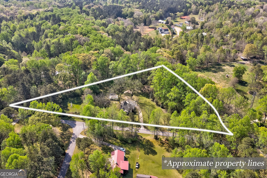 2051 Emmett Doster Road Northwest Monroe, GA 30656 - Photo 47 of 50 a view of a tennis court