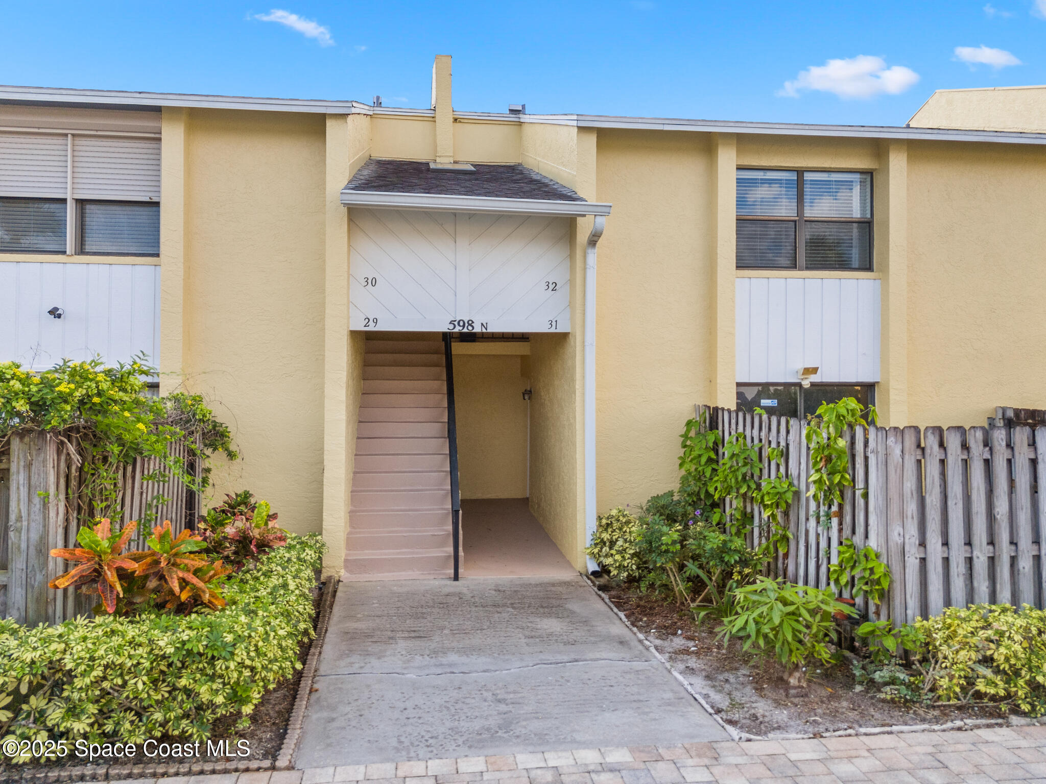 598 North Wickham Road, Unit 32 Melbourne, FL 32935 - Photo 20 of 21 Front of unit