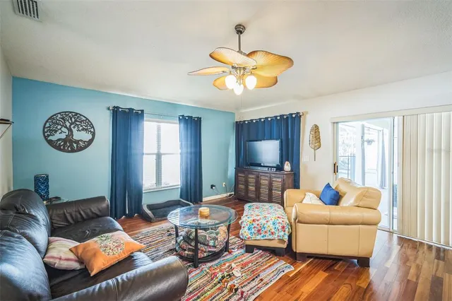 a bedroom with a bed and a table in it