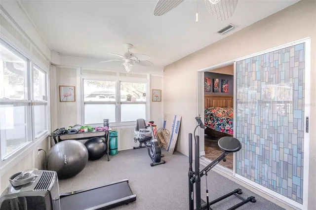 a bedroom with furniture and a window