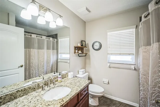 a workspace with furniture and a window