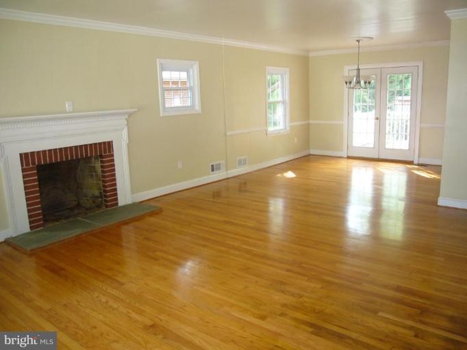 317 Worthington Road Towson, MD 21286 - Photo 9 of 14 a view of an empty room with glass door and wooden floor