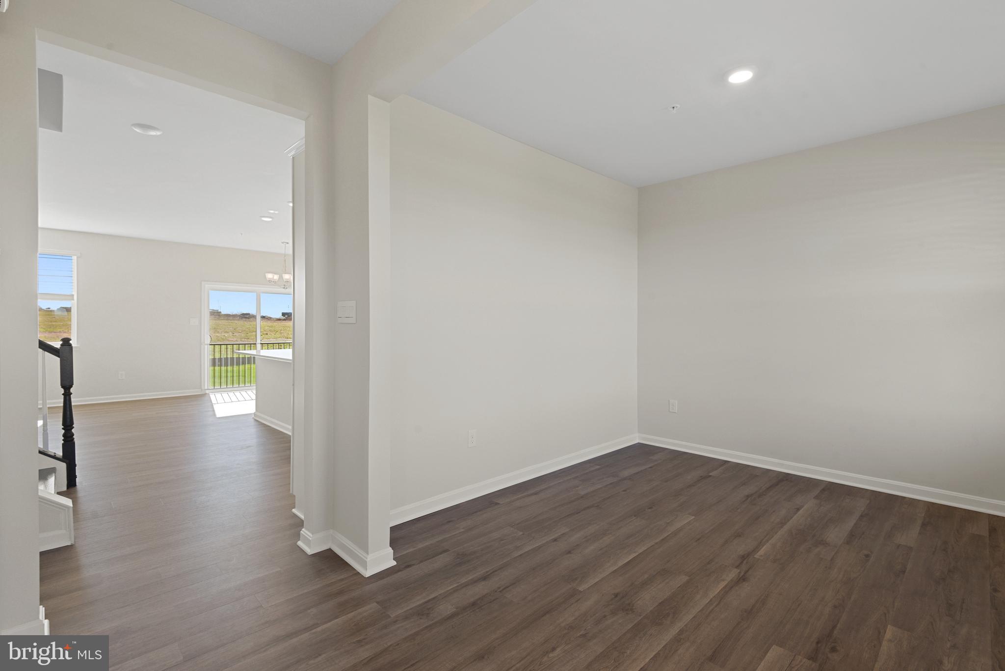 475 Ensemble Way Frederick, MD 21701 - Photo 6 of 25 a view of a room with wooden floor