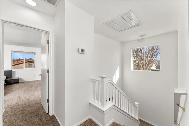 a workspace with furniture and window