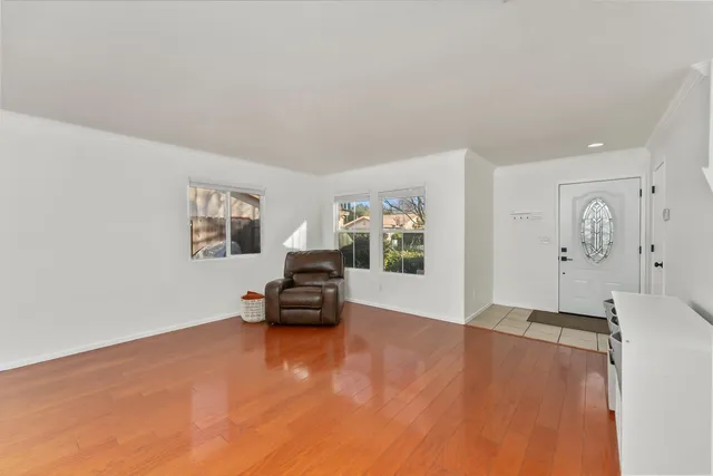 a view of livingroom with furniture and window