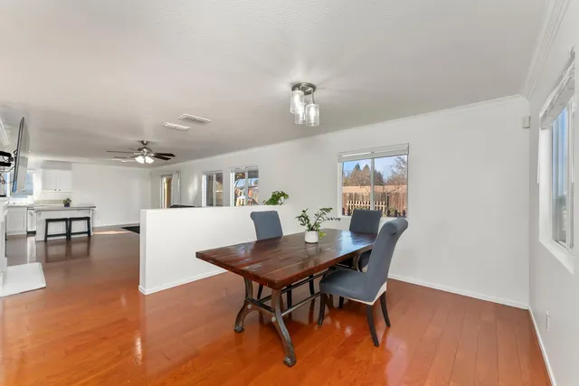 a view of a dining room with furniture