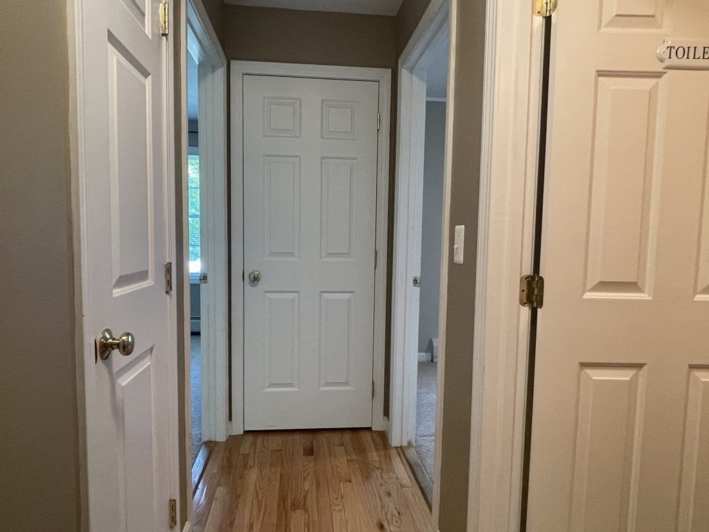 32 Jericho Road Rindge, NH 03461 - Photo 16 of 37 a view of a hallway with wooden floor