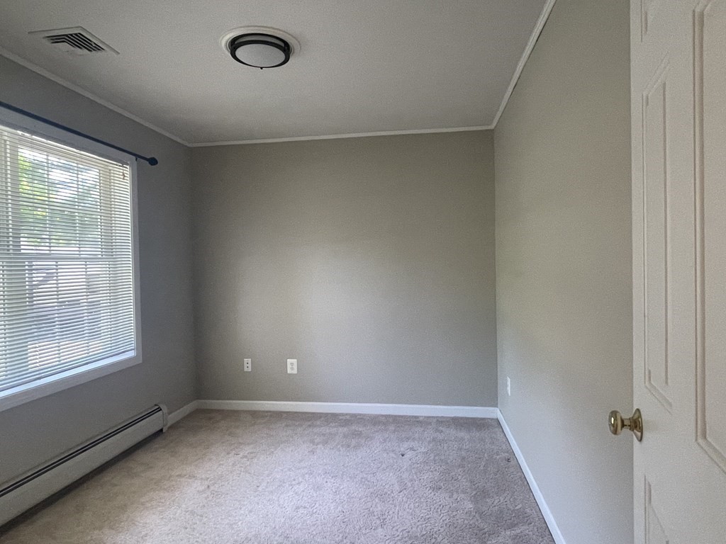 32 Jericho Road Rindge, NH 03461 - Photo 20 of 37 an empty room with a window