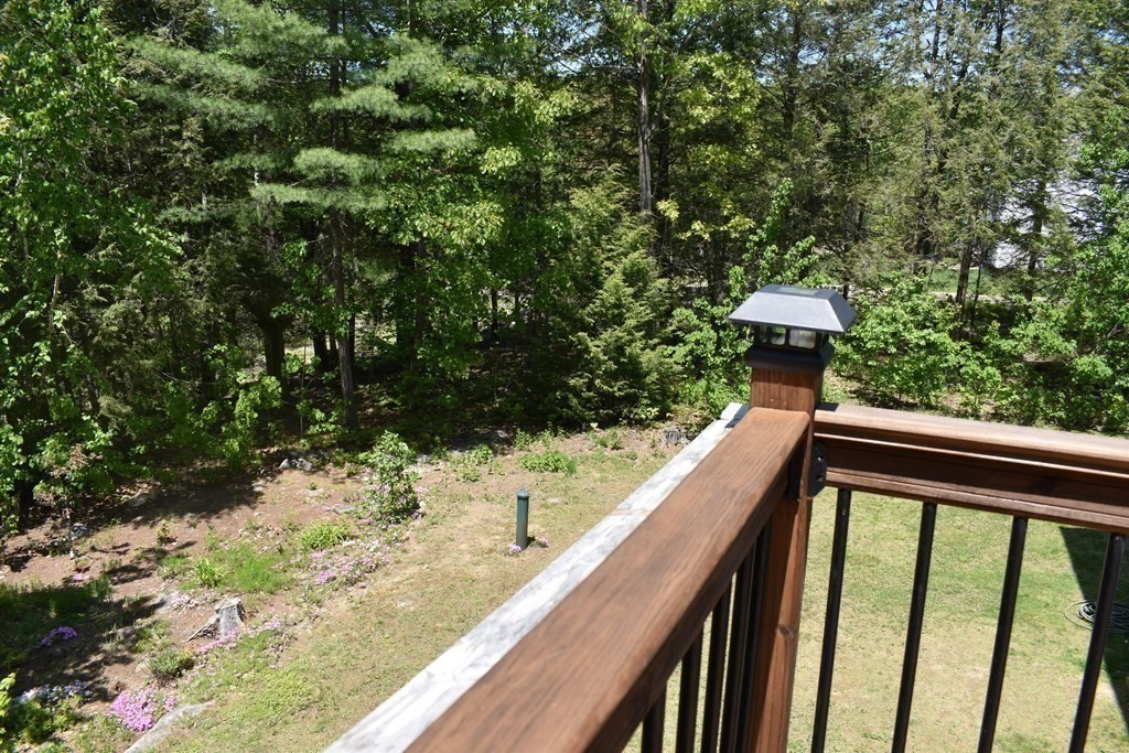 32 Jericho Road Rindge, NH 03461 - Photo 28 of 37 a view of balcony with wooden floor and fence