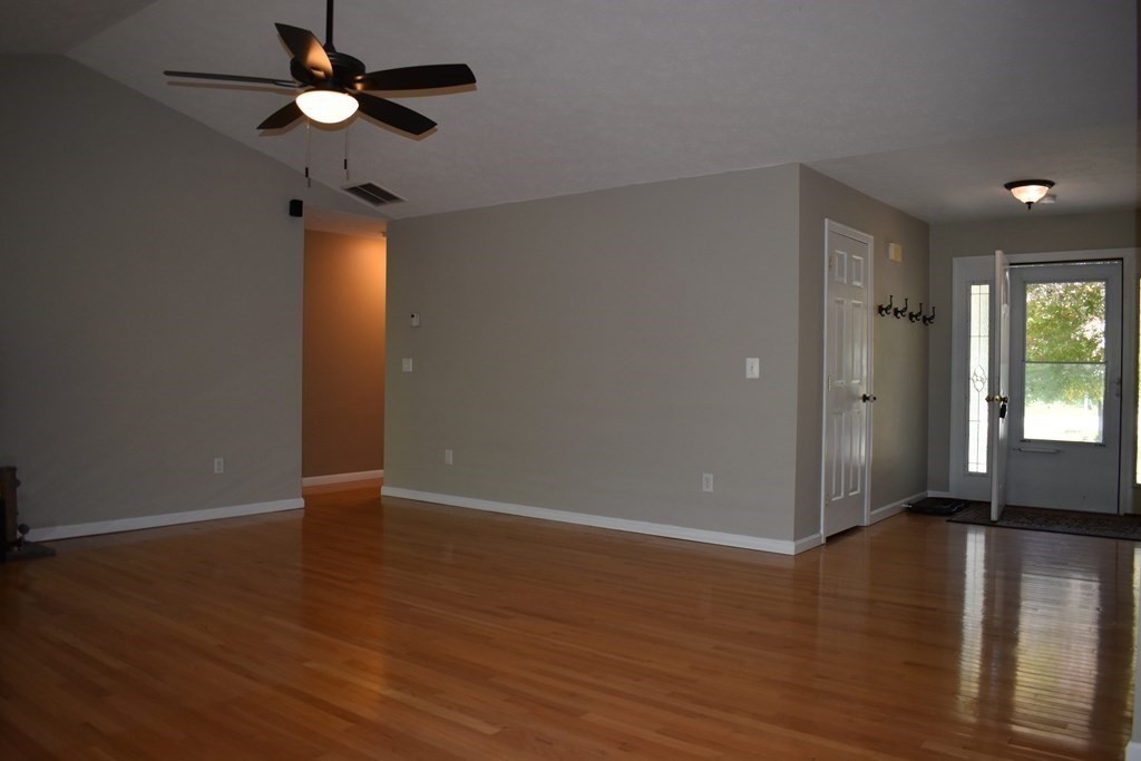 32 Jericho Road Rindge, NH 03461 - Photo 5 of 37 a view of an empty room with window and wooden floor