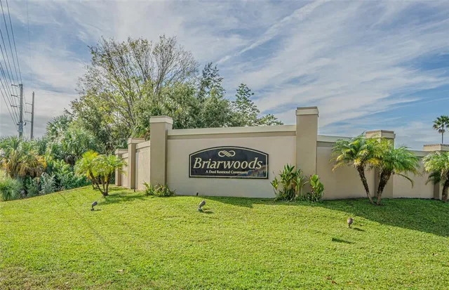 a sign broad in front of a building