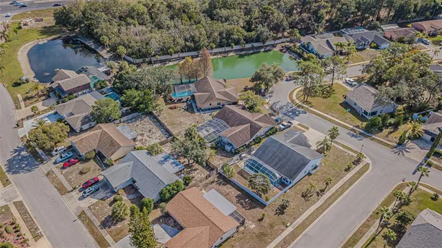 a view of a lake with a yard