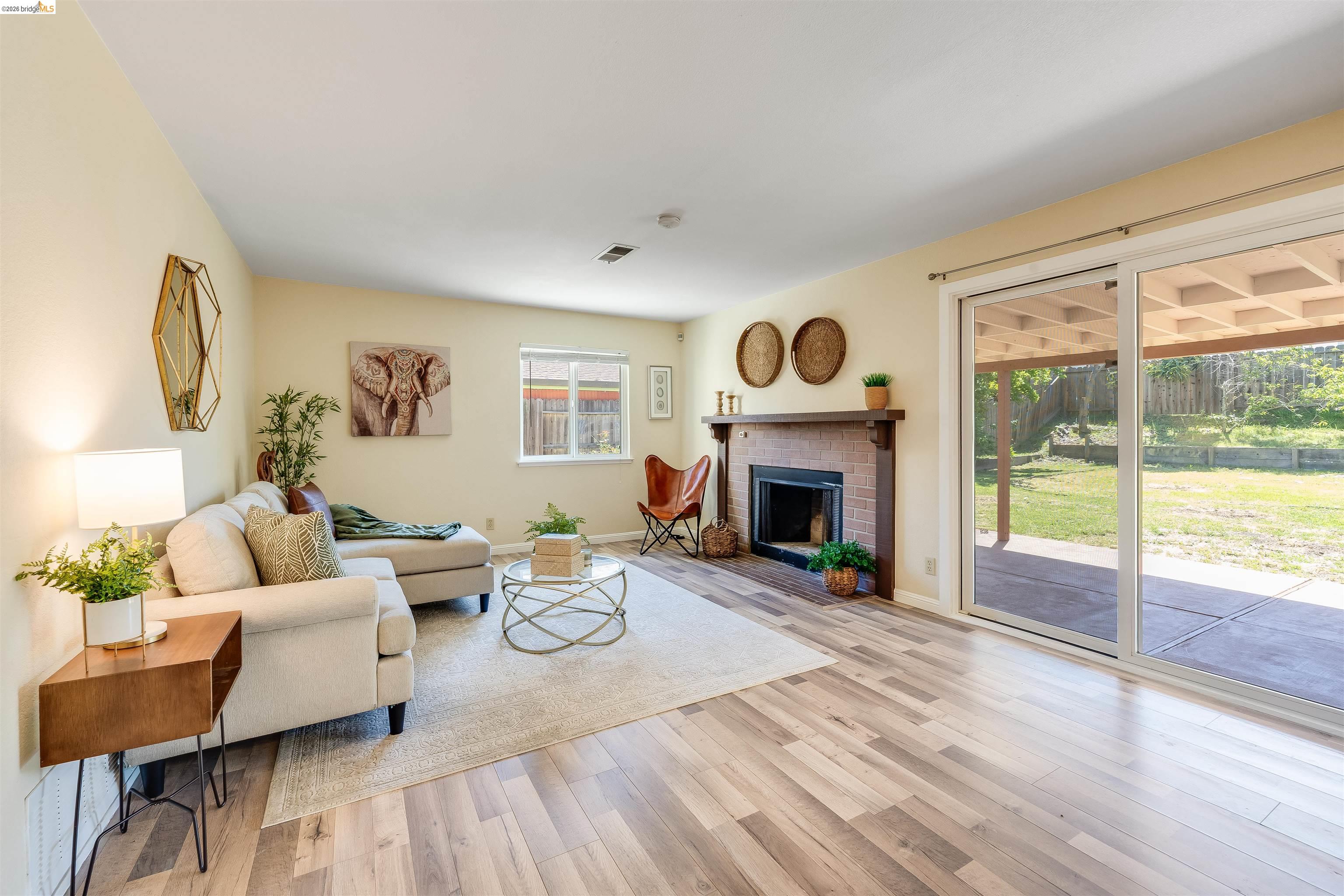 2142 Redwood Road Hercules, CA 94547 - Photo 13 of 37 Living room with a fireplace and light wood-type flooring