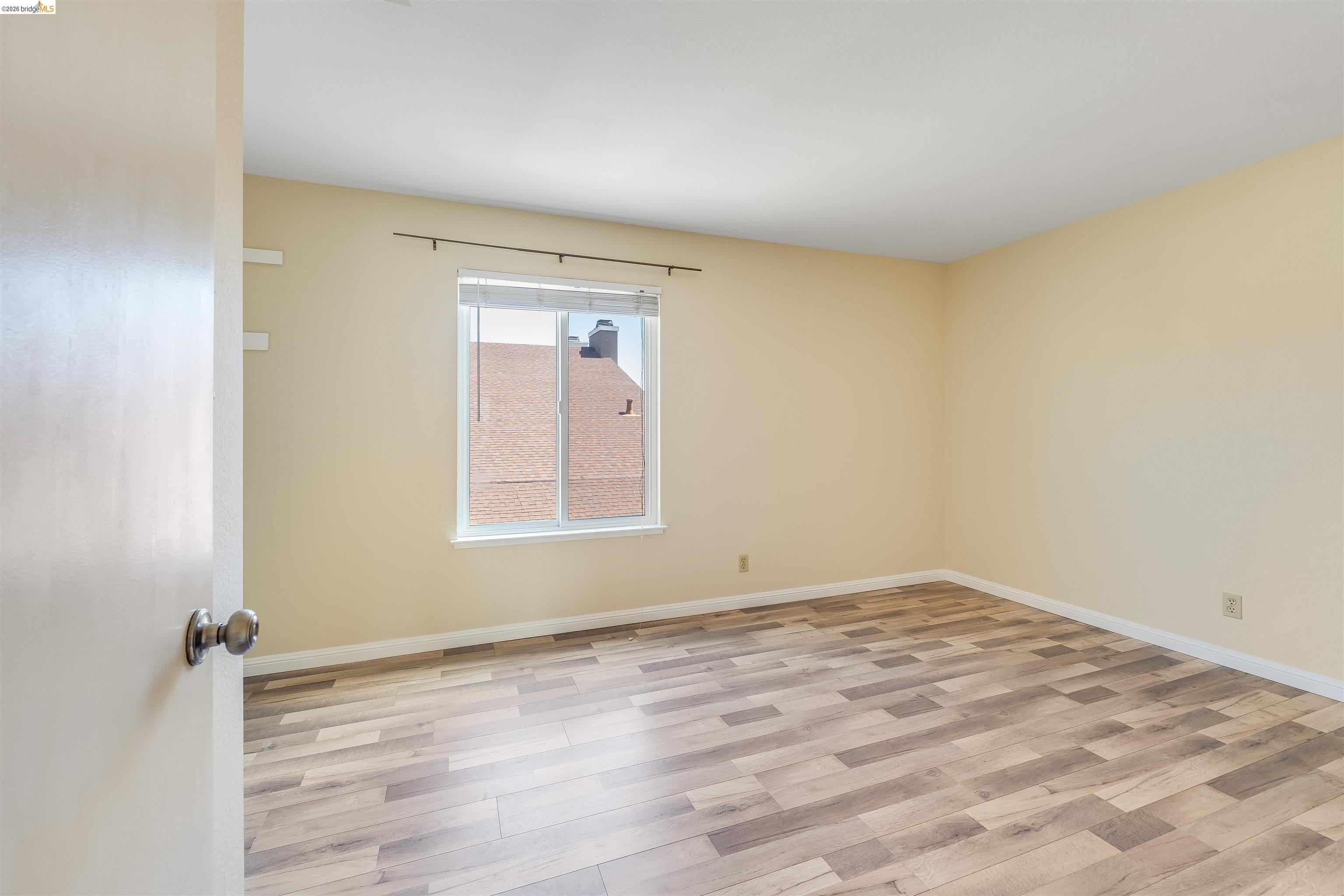 2142 Redwood Road Hercules, CA 94547 - Photo 19 of 37 Unfurnished room featuring light wood finished floors and baseboards