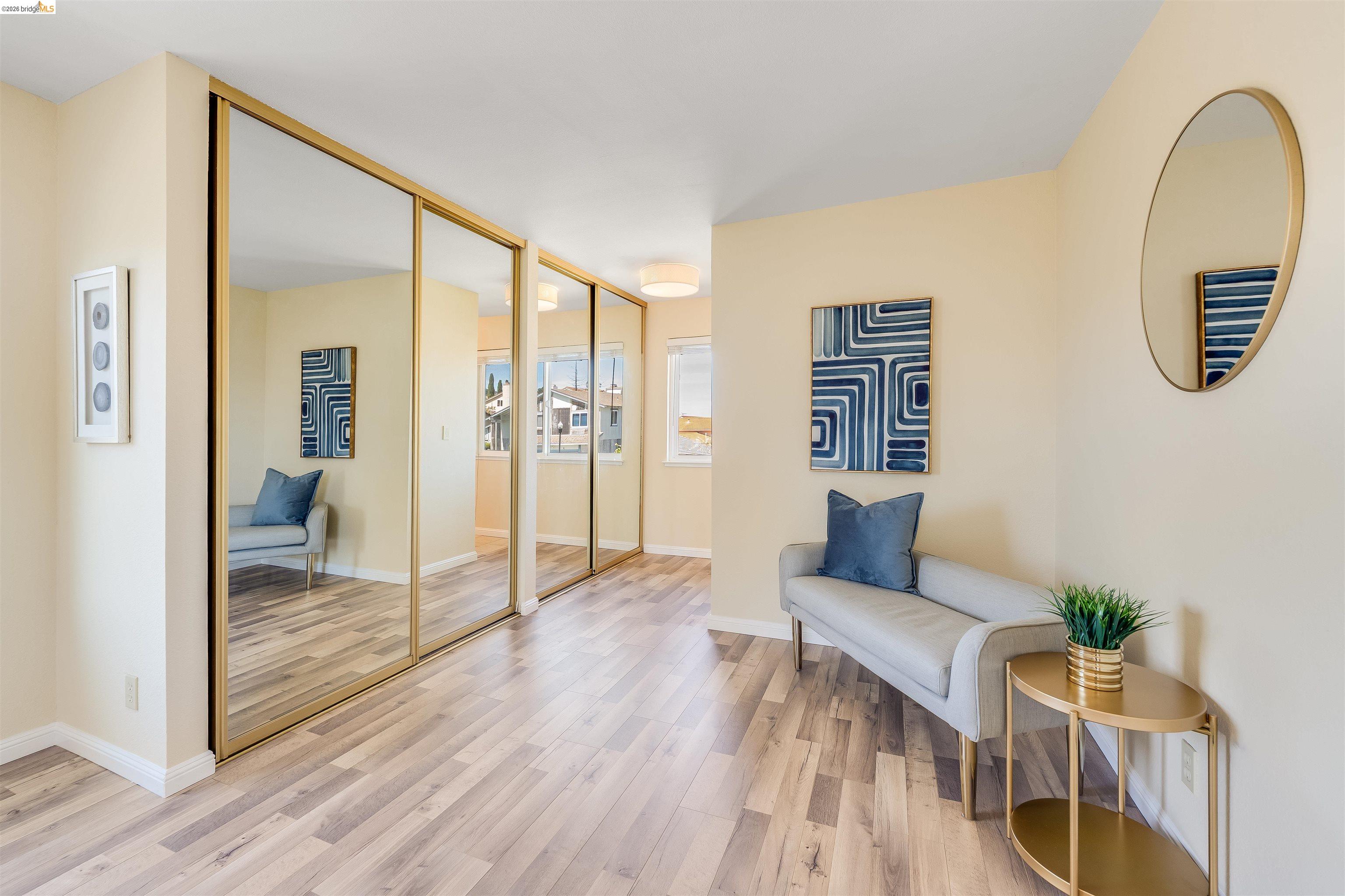 2142 Redwood Road Hercules, CA 94547 - Photo 27 of 37 Living area with light wood finished floors and baseboards