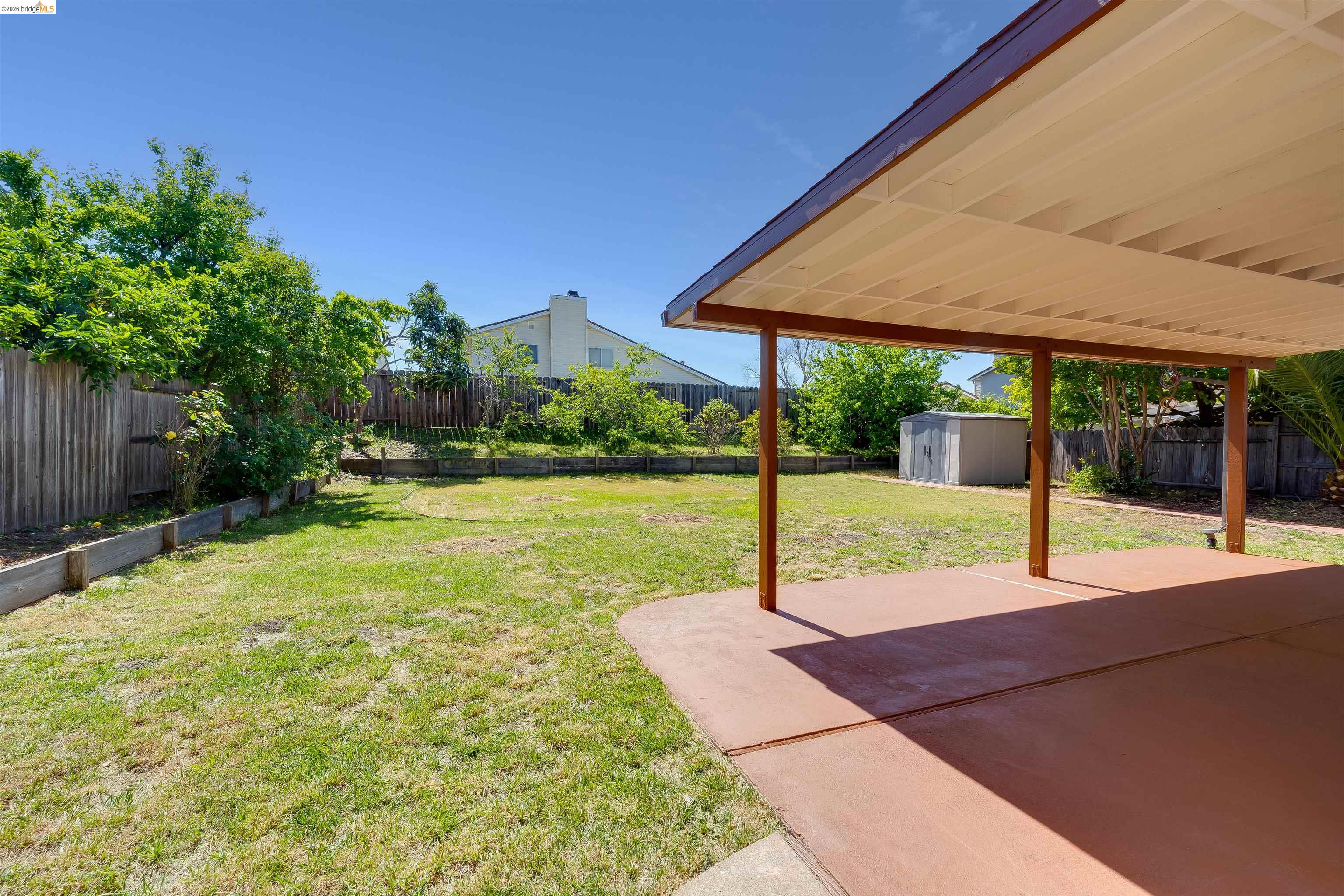 2142 Redwood Road Hercules, CA 94547 - Photo 32 of 37 Fenced backyard with a storage shed and a patio