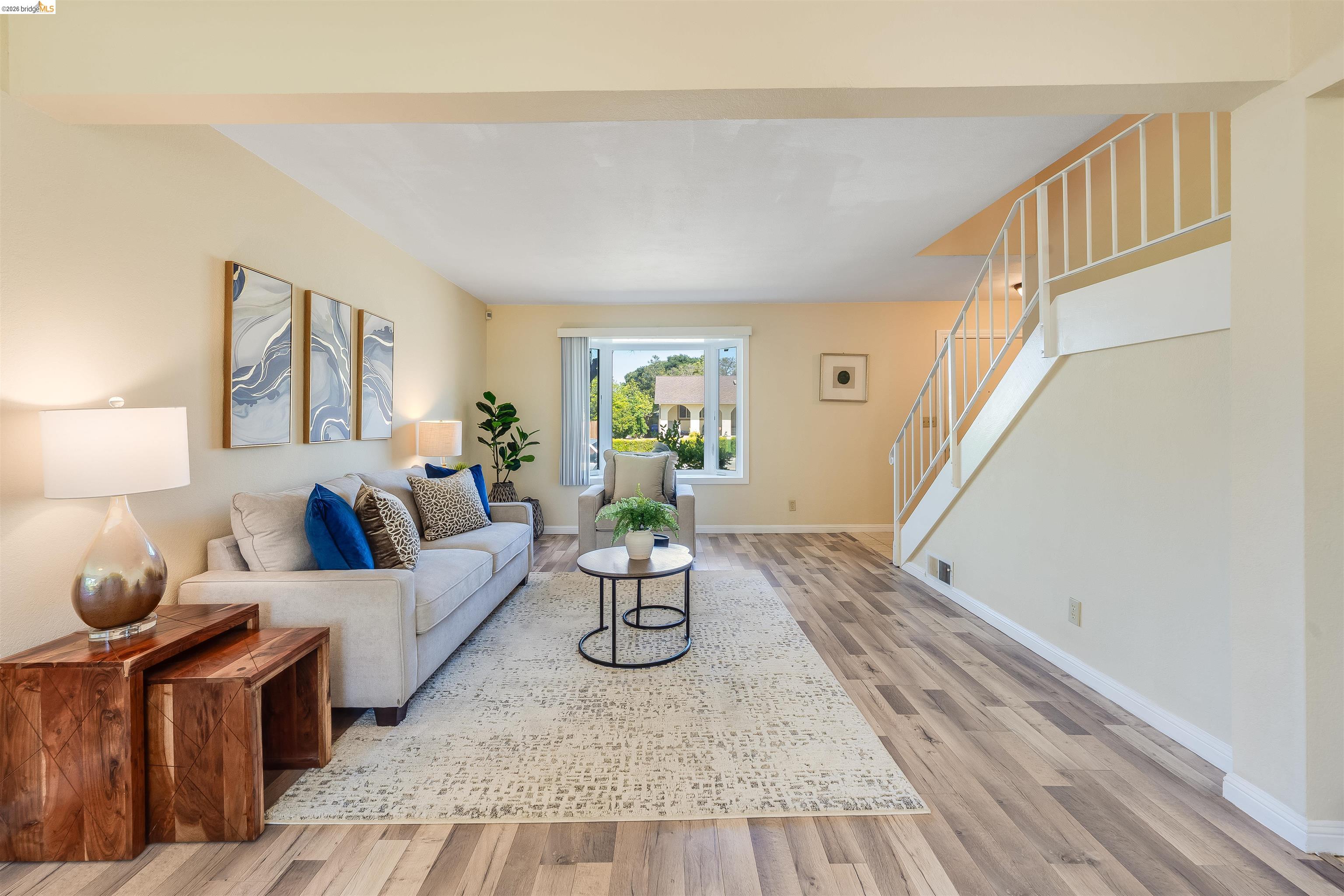 2142 Redwood Road Hercules, CA 94547 - Photo 6 of 37 Living room with stairs and light wood-type flooring