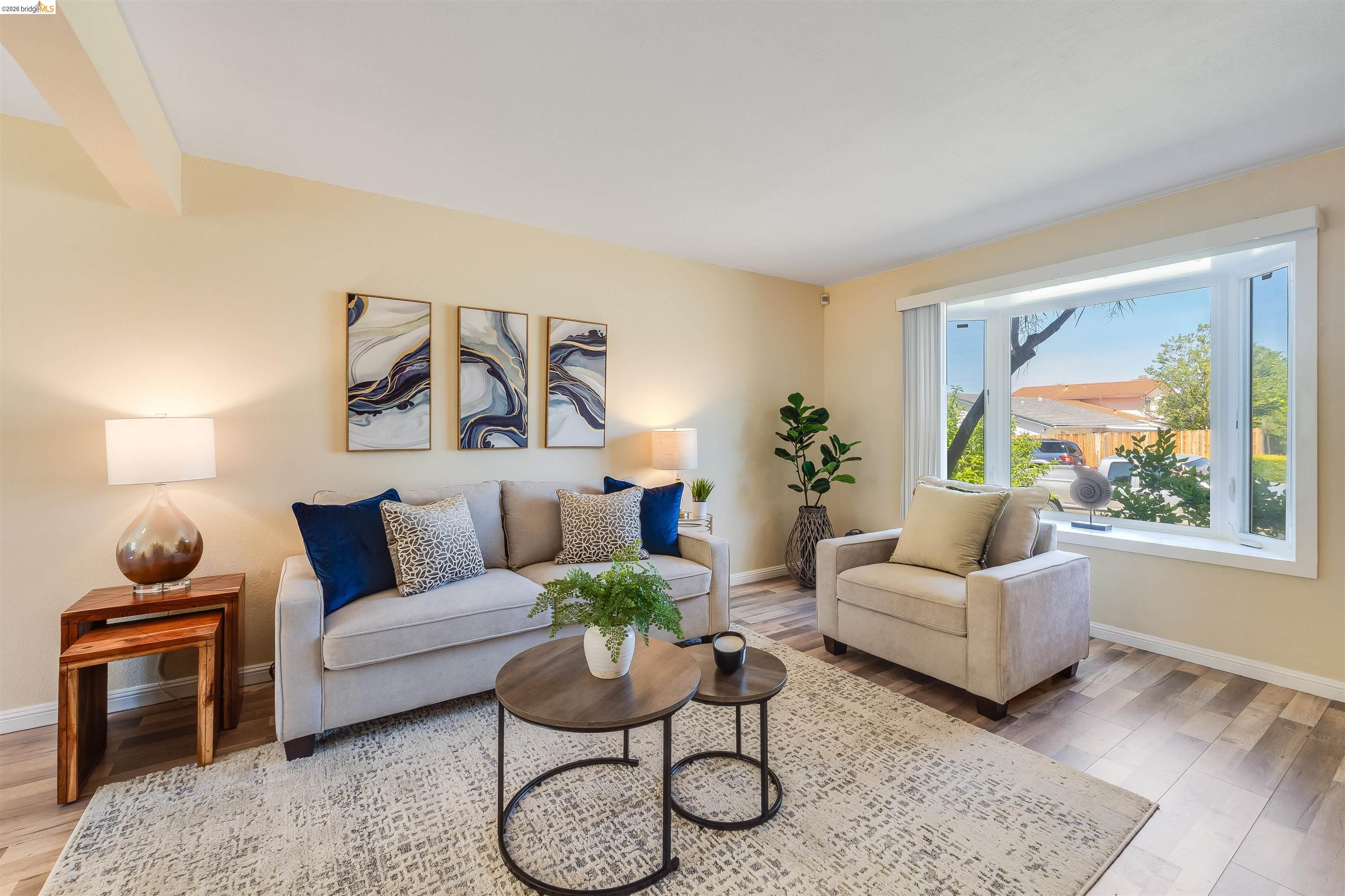 2142 Redwood Road Hercules, CA 94547 - Photo 7 of 37 Living room with light wood-type flooring and beam ceiling