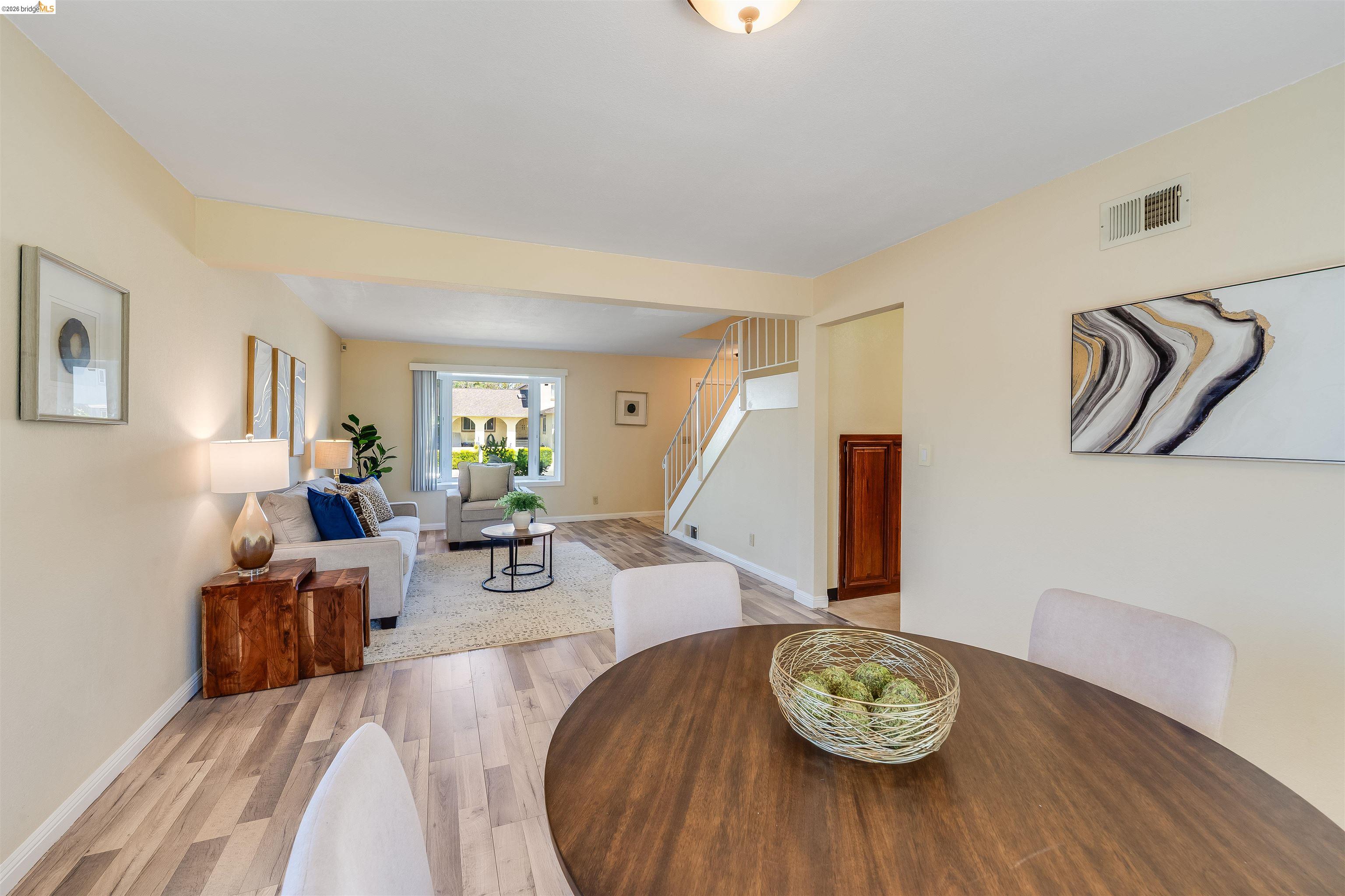 2142 Redwood Road Hercules, CA 94547 - Photo 9 of 37 Dining area with light wood finished floors and stairway
