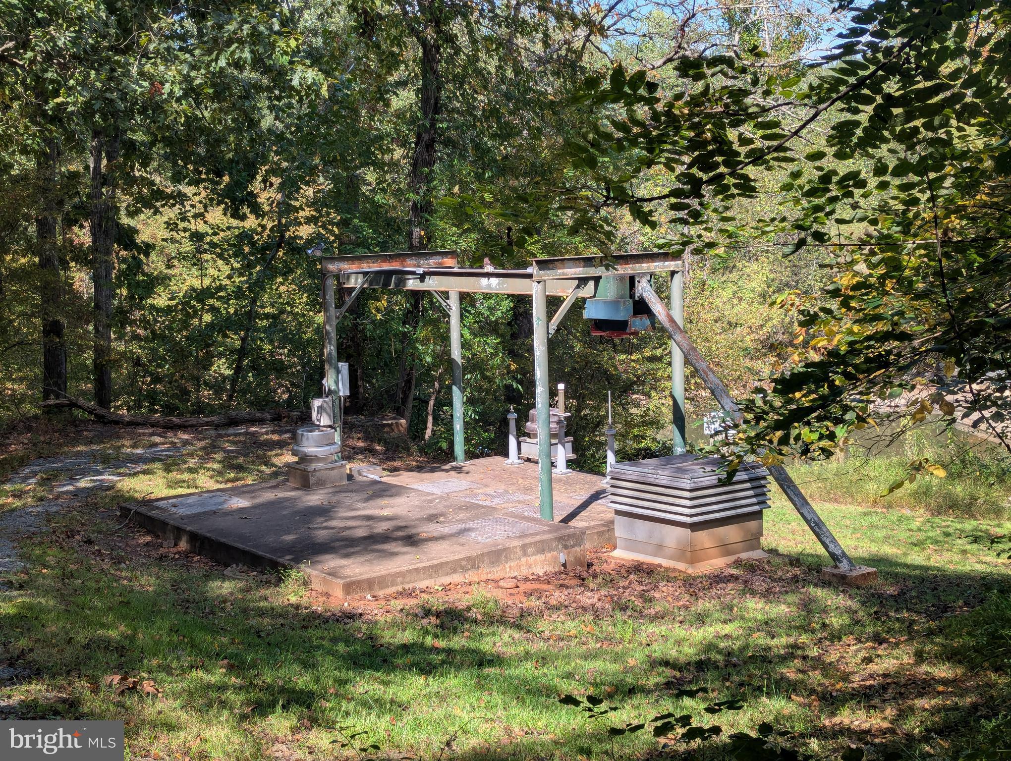 12967 Spicers Mill Road Orange, VA 22960 - Photo 7 of 21 a backyard of a house with barbeque oven table and chairs
