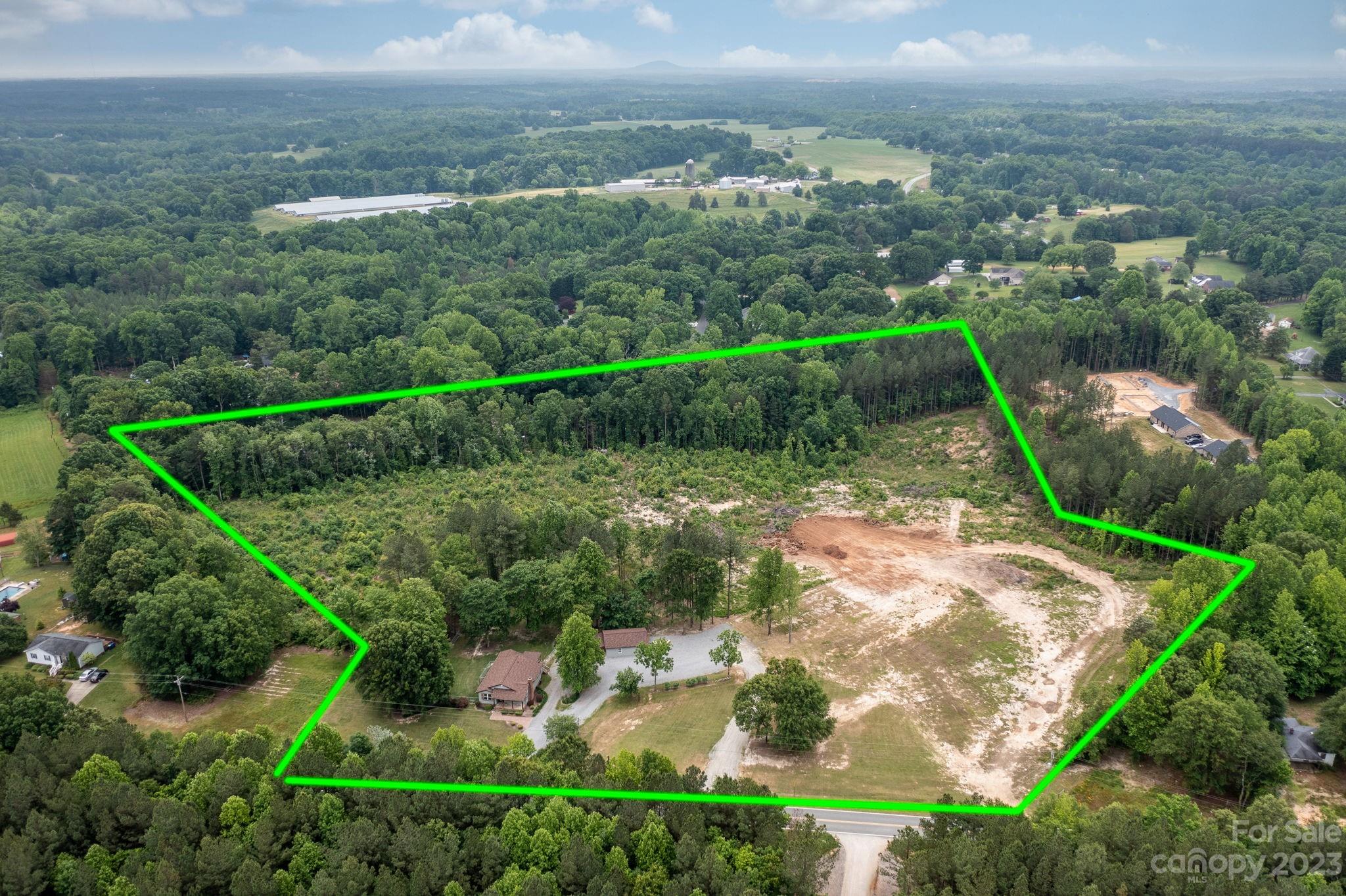 1335 Hill Road Lincolnton, NC 28092 - Photo 13 of 38 an aerial view of residential houses with outdoor space and trees
