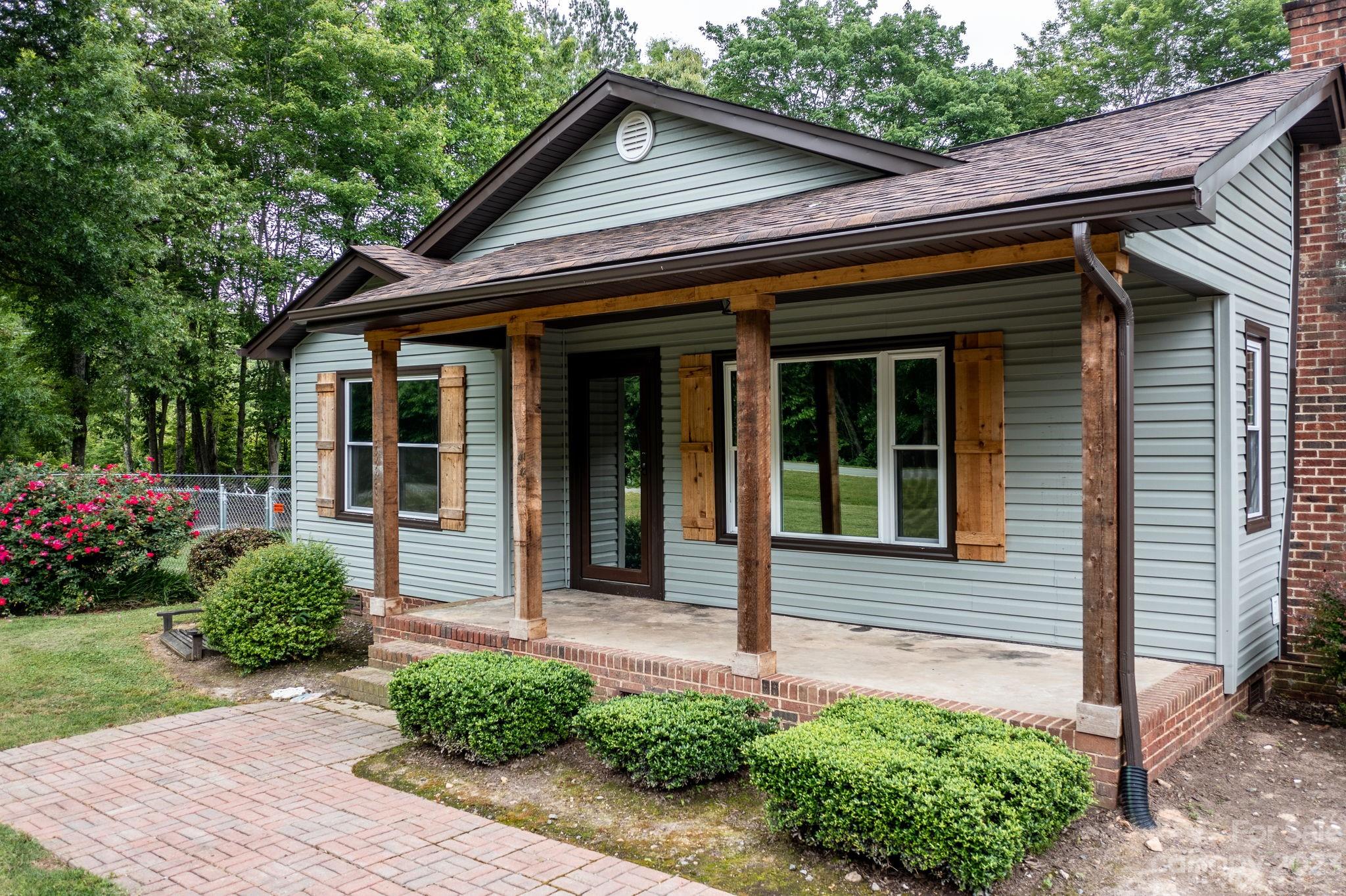 1335 Hill Road Lincolnton, NC 28092 - Photo 14 of 38 a front view of a house with garden