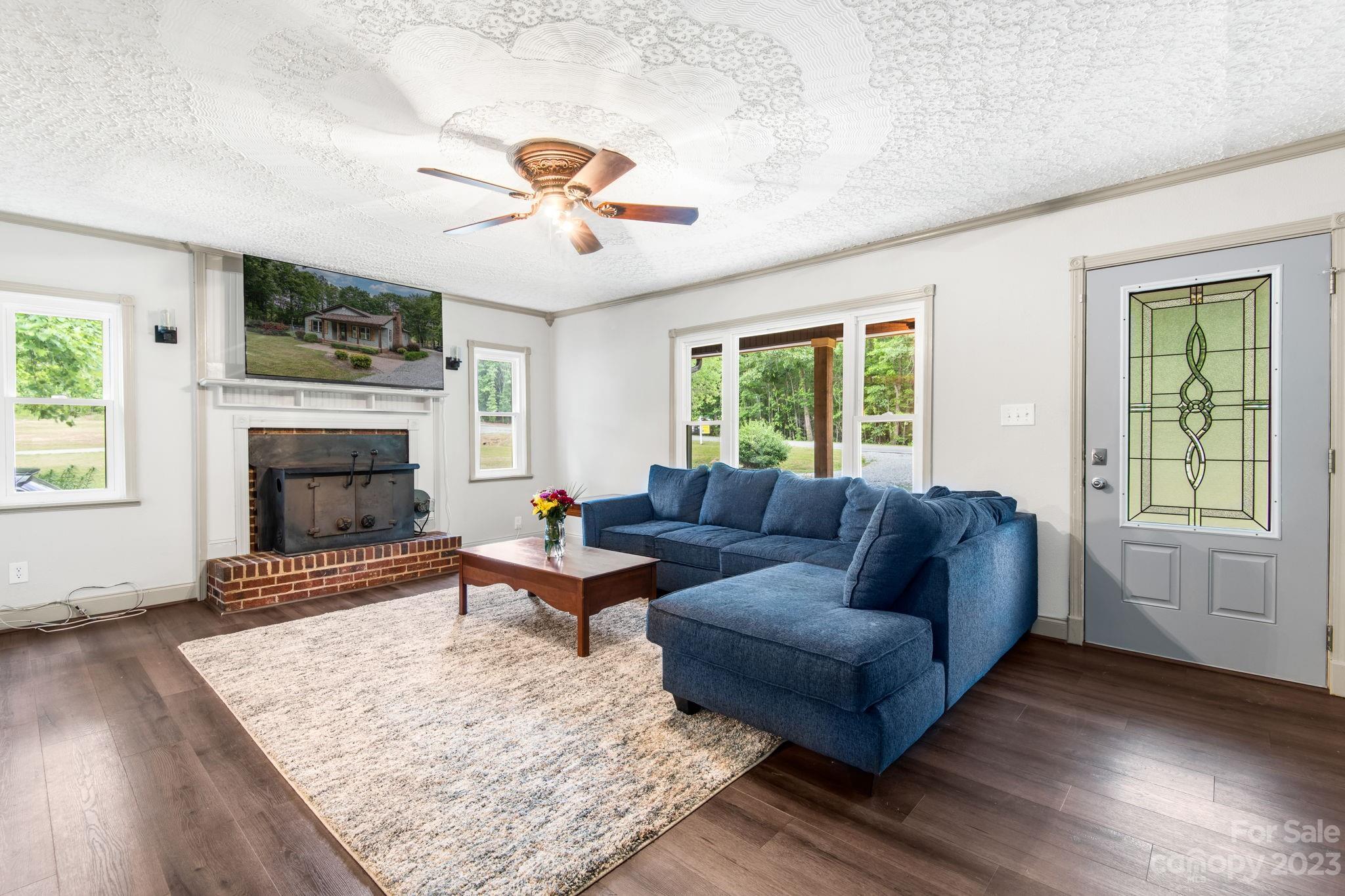 1335 Hill Road Lincolnton, NC 28092 - Photo 15 of 38 a living room with furniture fireplace and window