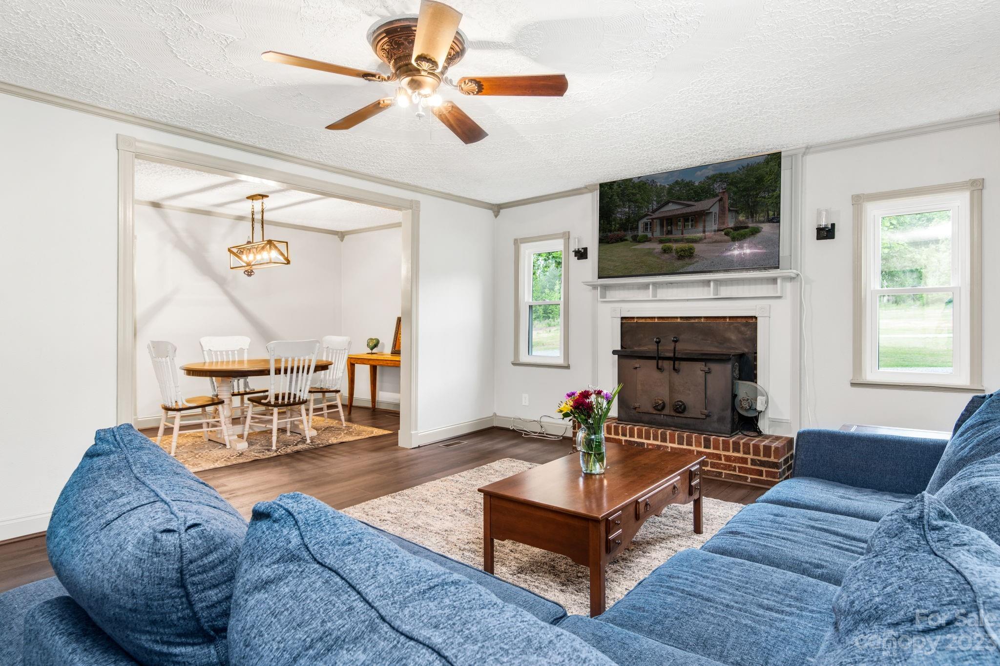 1335 Hill Road Lincolnton, NC 28092 - Photo 16 of 38 a living room with furniture fireplace and flat screen tv