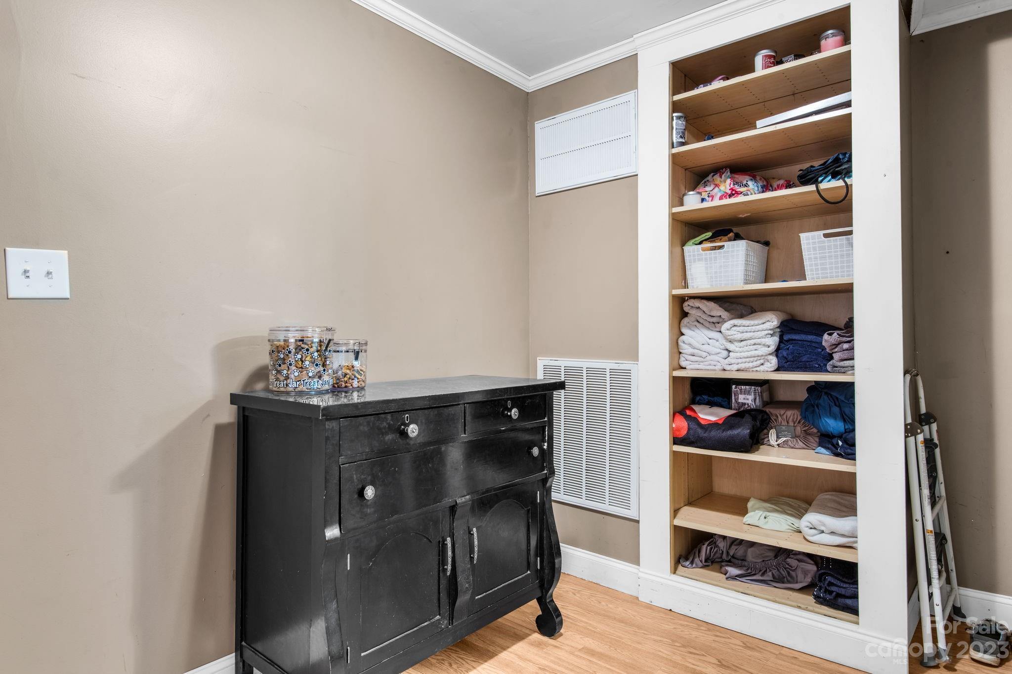 1335 Hill Road Lincolnton, NC 28092 - Photo 23 of 38 a view of walk in closet with clothes and shoes
