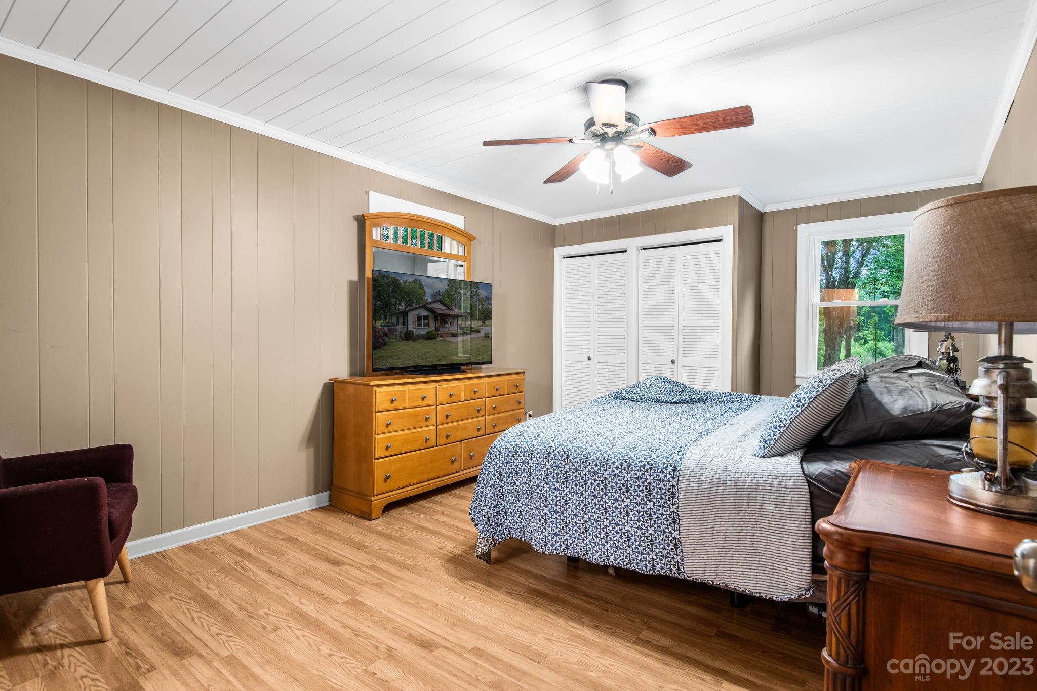 1335 Hill Road Lincolnton, NC 28092 - Photo 24 of 38 a bedroom with a bed and wooden floor