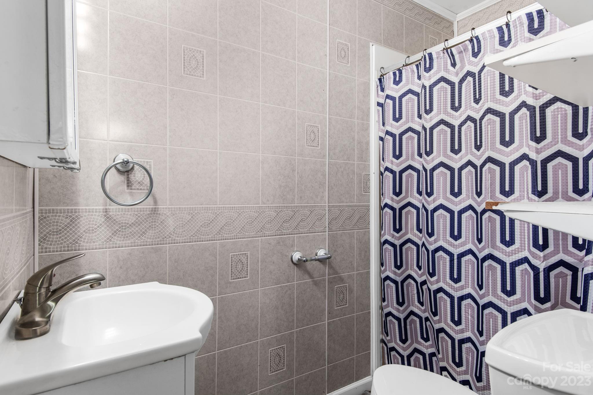 1335 Hill Road Lincolnton, NC 28092 - Photo 25 of 38 a bathroom with a sink and a mirror