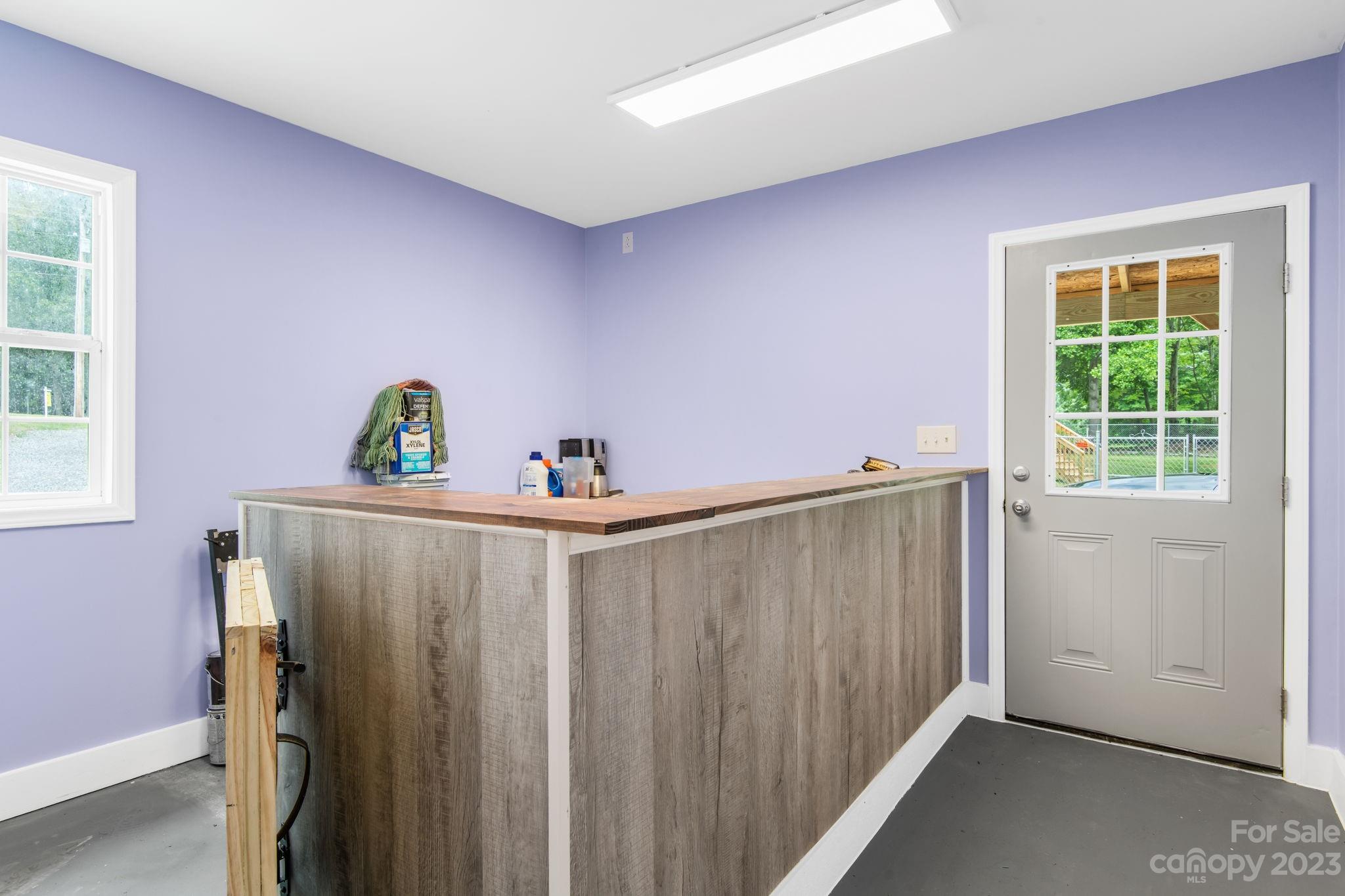1335 Hill Road Lincolnton, NC 28092 - Photo 30 of 38 a view of a closet area with wooden floor and windows