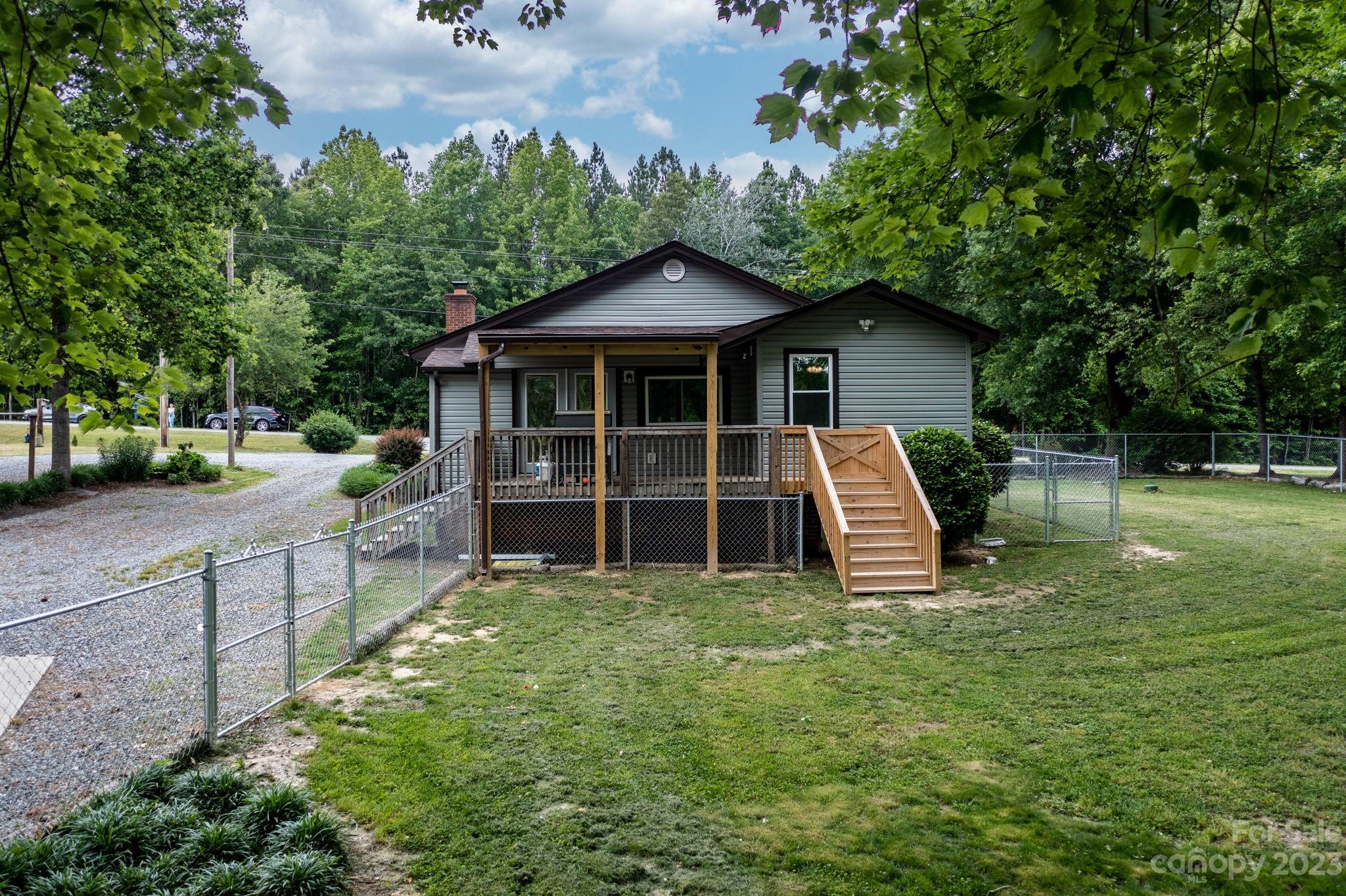 1335 Hill Road Lincolnton, NC 28092 - Photo 5 of 38 a view of a house with a yard and sitting area