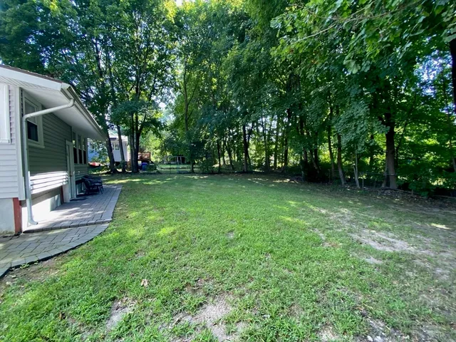 a view of a backyard with a garden