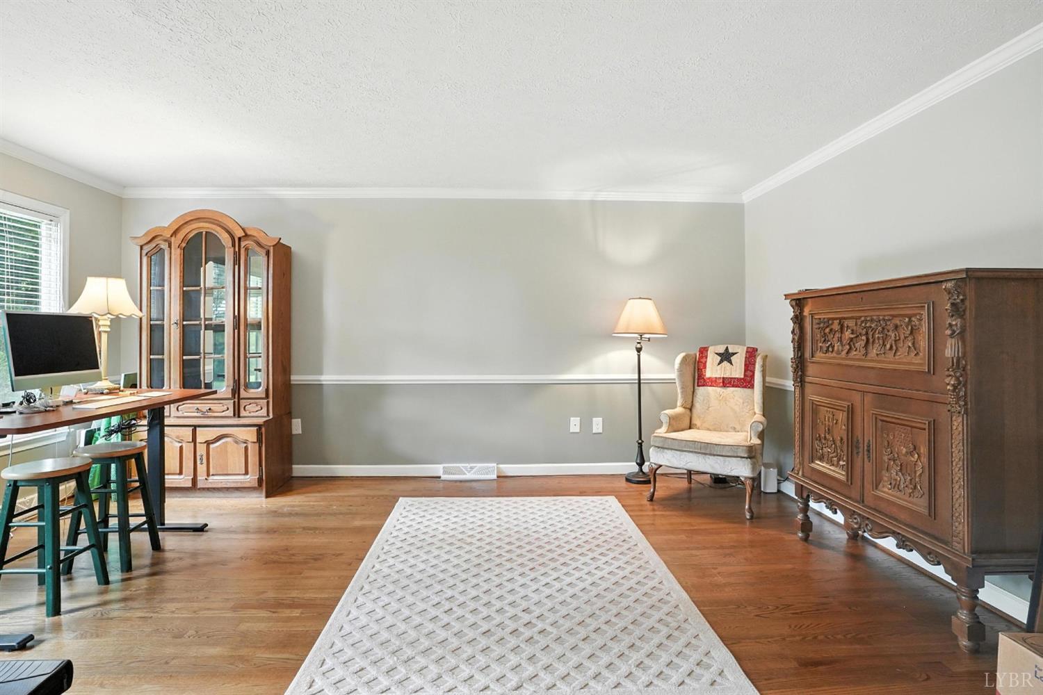 69 Gough Road Rustburg, VA 24588 - Photo 16 of 61 a living room with furniture and a flat screen tv